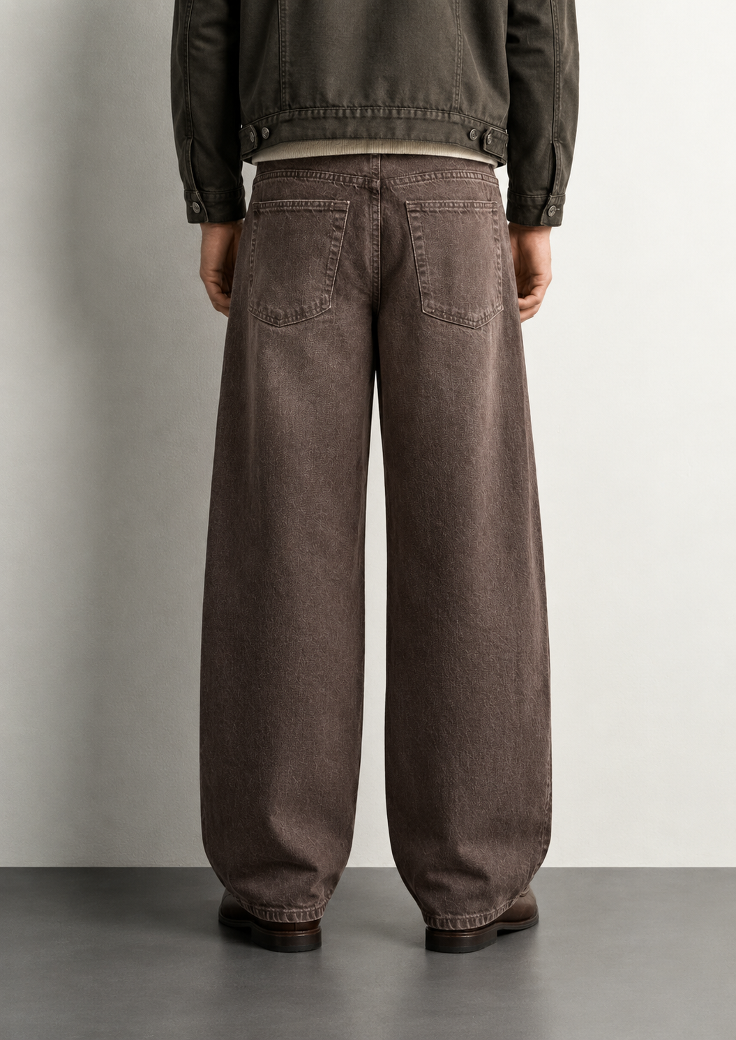 Washed Brown Baggy Jeans — worn, close-up