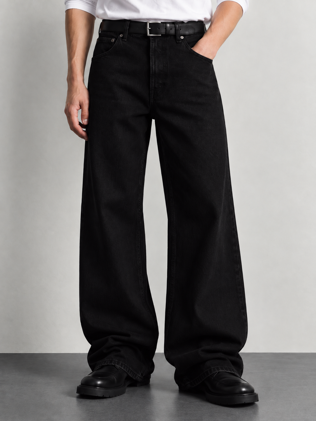 Midnight Black Wide-Leg Jeans — worn, close-up