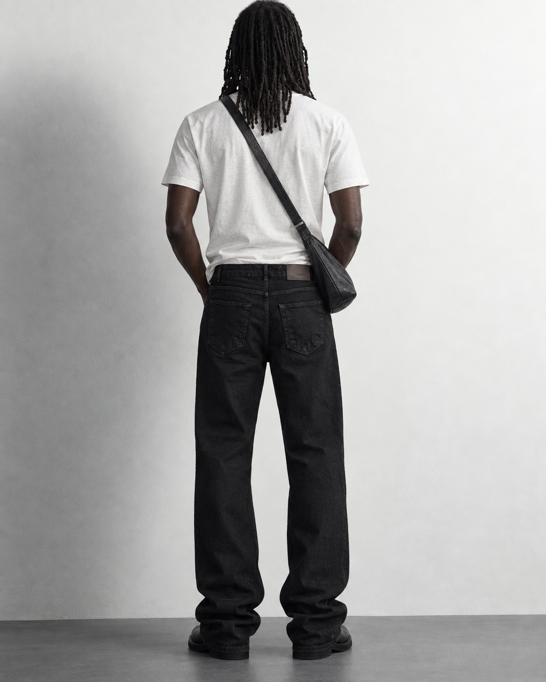 Jet Black Baggy Jeans — worn, back