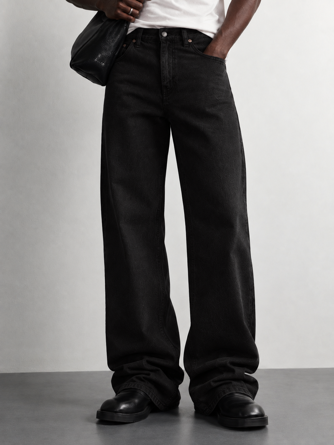 Jet Black Baggy Jeans — worn, close-up