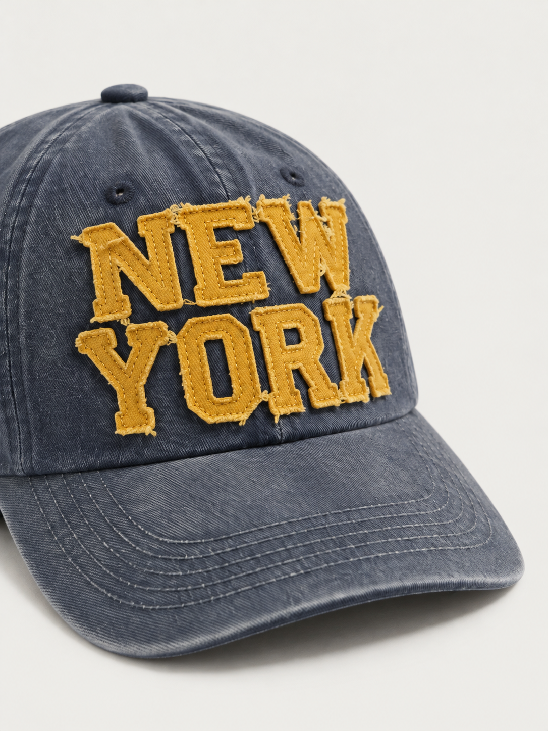 New York Heritage Vintage Cap — worn, close-up