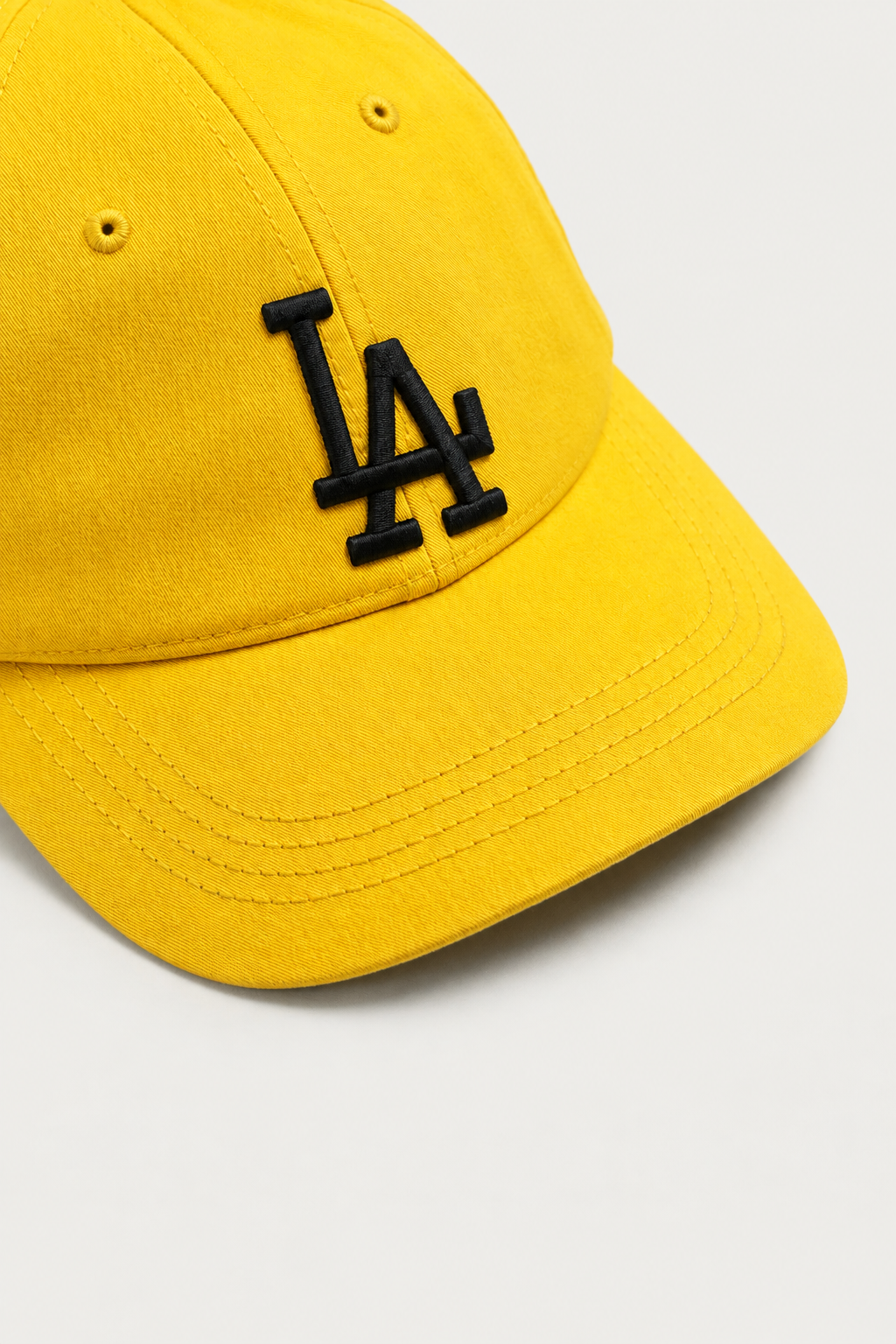 LA Boldmark Cotton Cap — worn, close-up