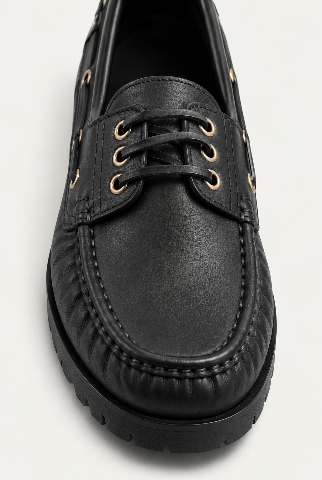 Black Leather Lug Sole Boat Shoes — worn, close-up