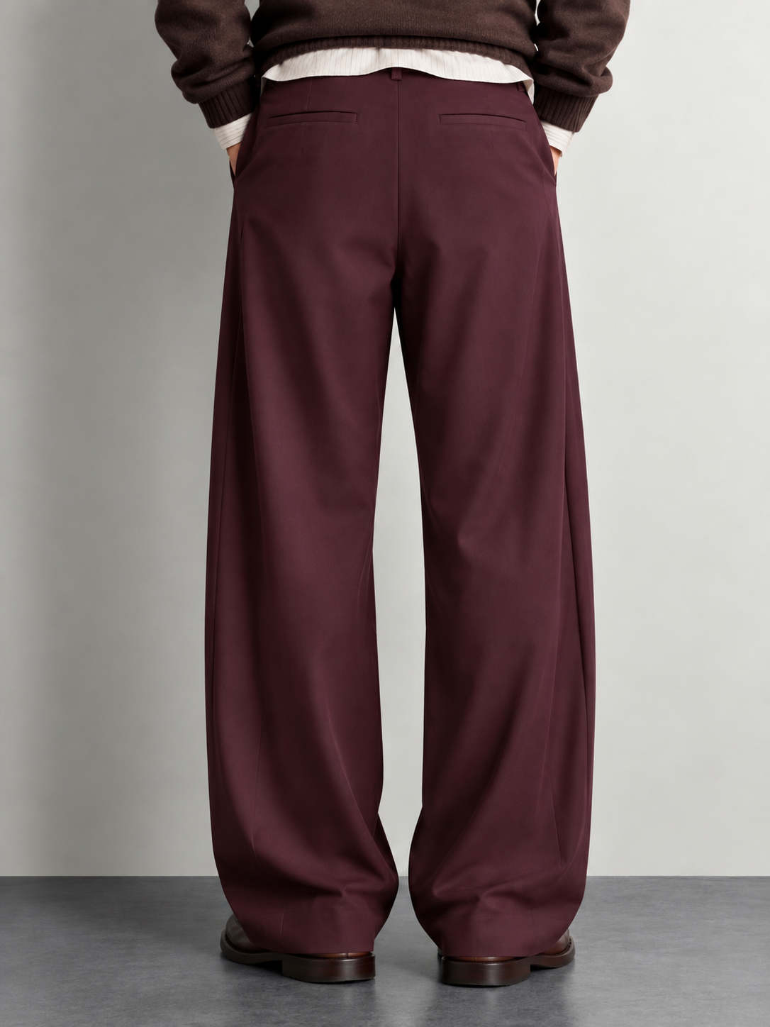 DEEP PLEAT WIDE LEG TROUSERS — worn, back
