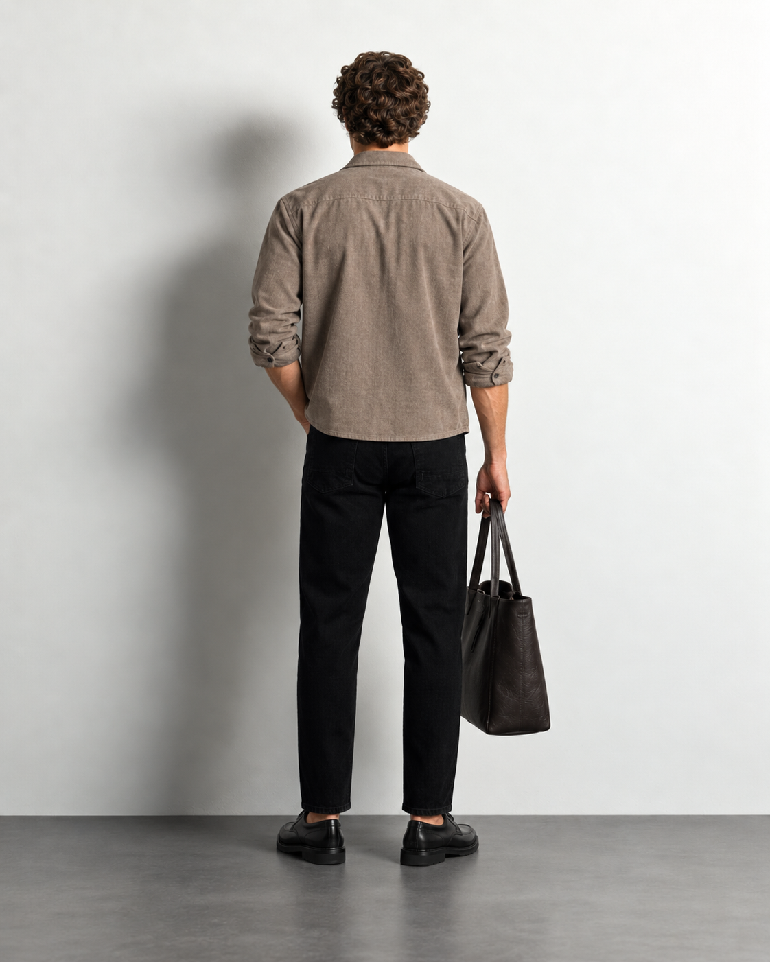 Essential Black Slim Jeans — worn, back