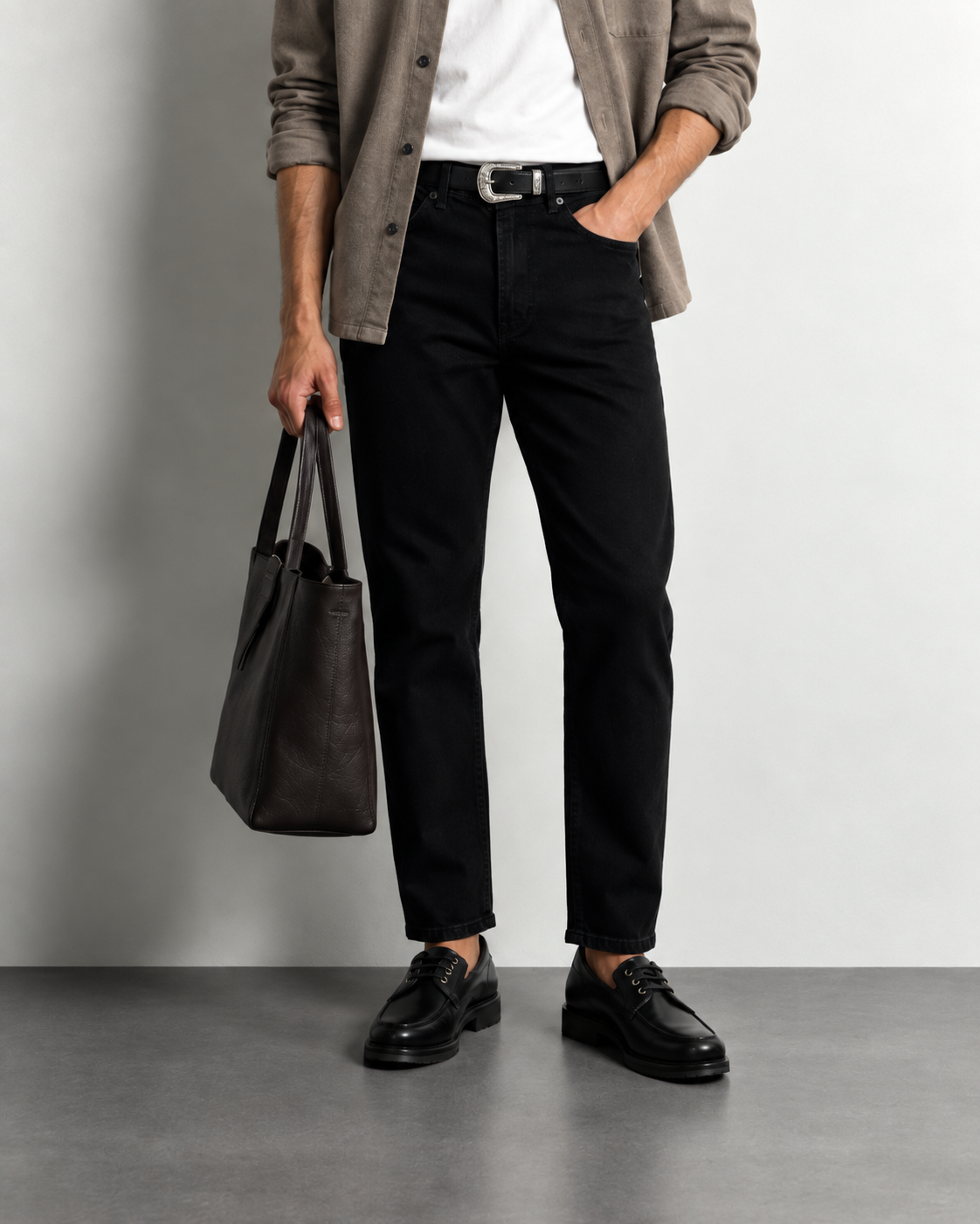 Essential Black Slim Jeans — worn, close-up