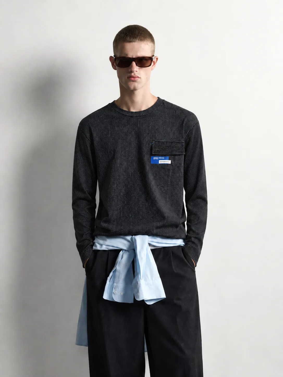 Vertical Pinstripe Pocket Sweater — worn, close-up