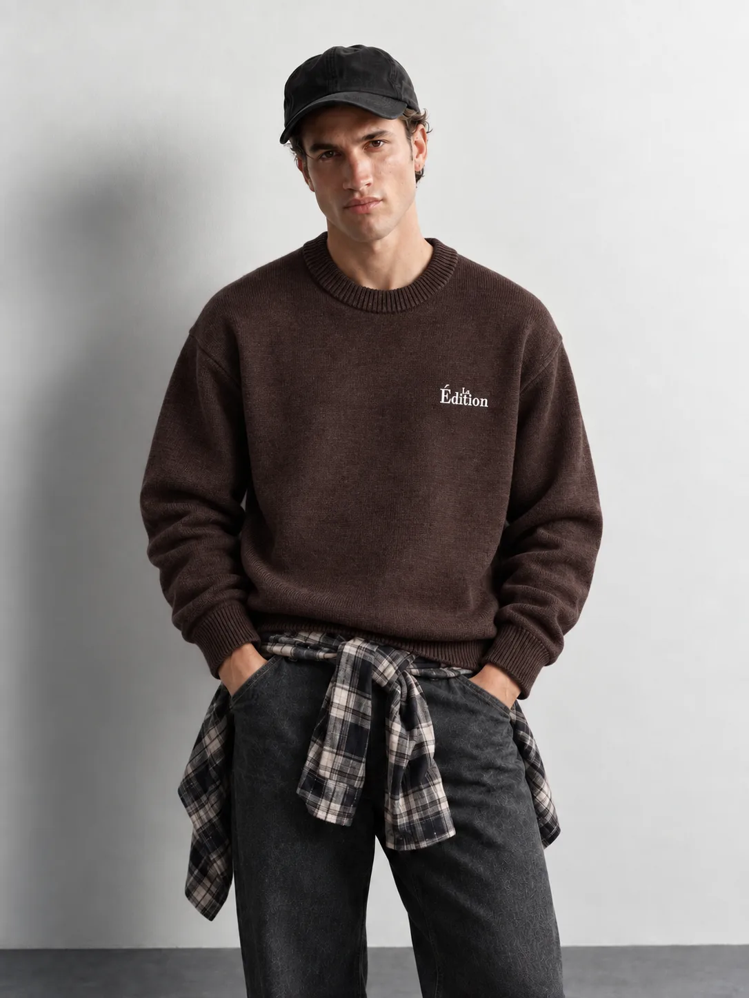 Washed Embroidered Crew Neck Sweater — worn, close-up